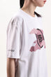 White T shirt with pink print